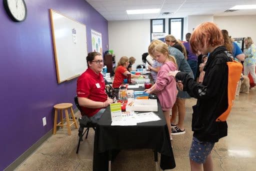 Display image of children in line at The Works Museum